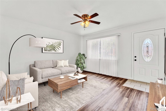 244 E Woodward Heights Blvd, Hazel Park, MI 48030 - living room with plenty of natural light, a ceiling fan, wood finished floors, and baseboards
