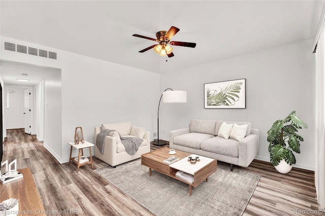 244 E Woodward Heights Blvd, Hazel Park, MI 48030 - living area with wood finished floors, ceiling fan, and baseboards