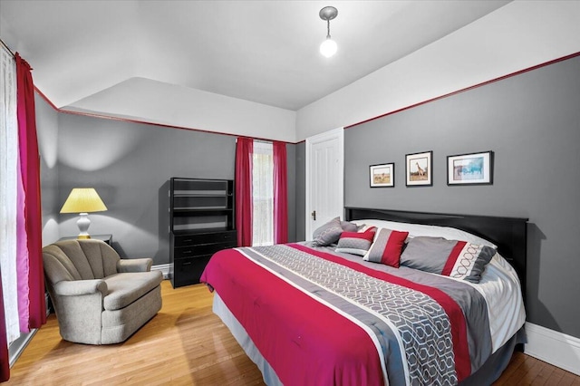 244 Paris Ave SE, Grand Rapids, MI 49503 - bedroom featuring wood finished floors and baseboards