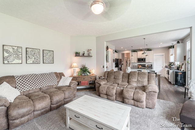 12150 Apple Cart Ln, Lowell, MI 49331 - living room with ceiling fan and dark wood-style floors