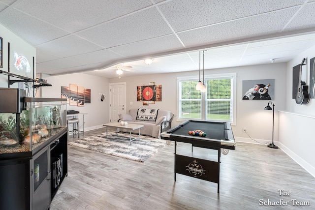 12150 Apple Cart Ln, Lowell, MI 49331 - game room featuring a paneled ceiling, baseboards, wood finished floors, ceiling fan, and pool table