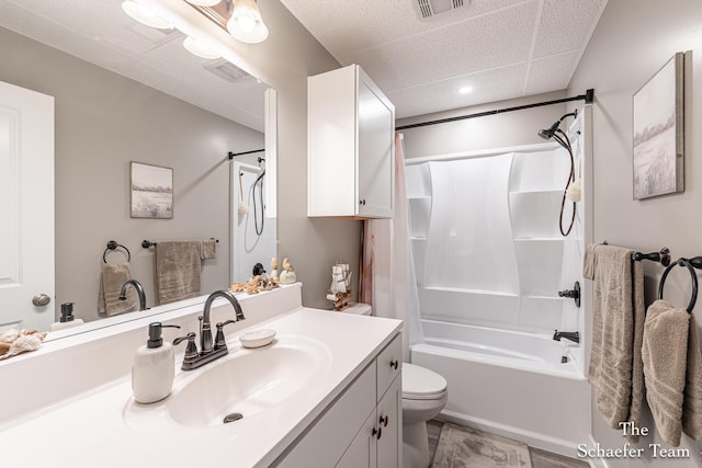 12150 Apple Cart Ln, Lowell, MI 49331 - full bathroom with toilet, vanity, shower / bath combination, and a drop ceiling
