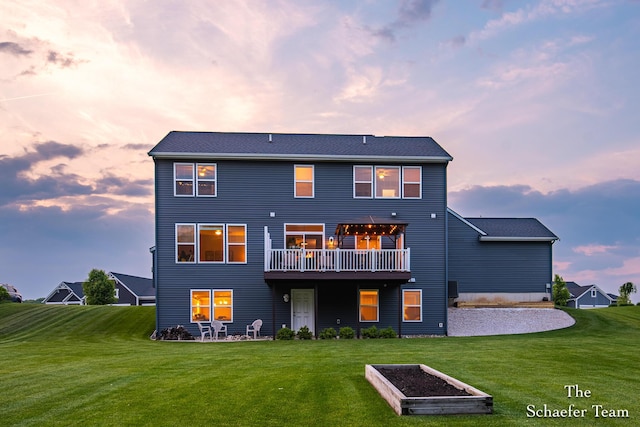 12150 Apple Cart Ln, Lowell, MI 49331 - back of property featuring a lawn and a deck