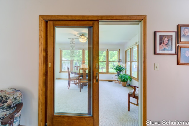 19151 Pine Grove Ct, Spring Lake, MI 49456 - doorway featuring carpet flooring and baseboards