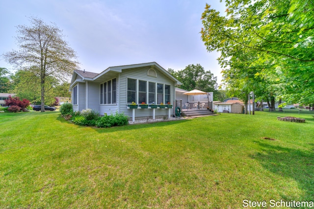 19151 Pine Grove Ct, Spring Lake, MI 49456 - rear view of property featuring a wooden deck