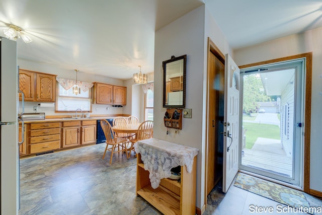 19151 Pine Grove Ct, Spring Lake, MI 49456 - foyer featuring a chandelier