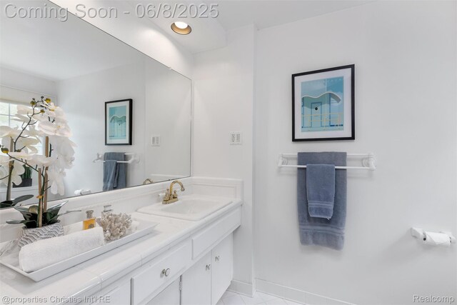 3379 Wormer Dr, Waterford, MI 48329 - bathroom with vanity and baseboards