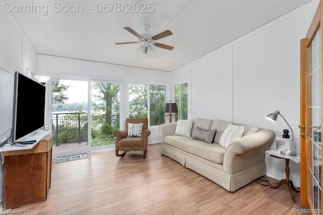 3379 Wormer Dr, Waterford, MI 48329 - living area with light wood finished floors, a ceiling fan, and healthy amount of natural light