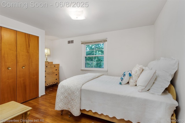 3379 Wormer Dr, Waterford, MI 48329 - bedroom featuring wood finished floors and a closet