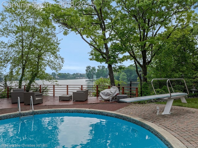 3379 Wormer Dr, Waterford, MI 48329 - view of swimming pool featuring outdoor lounge area and a deck with water view