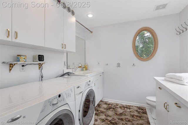 3379 Wormer Dr, Waterford, MI 48329 - washroom with washer and clothes dryer and baseboards