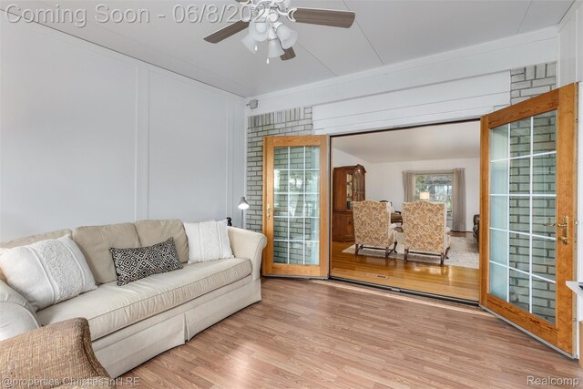 3379 Wormer Dr, Waterford, MI 48329 - living area featuring a ceiling fan and wood finished floors