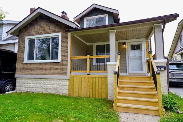 12645 Pinehurst St, Detroit, MI 48238 - bungalow-style house featuring a chimney and a porch