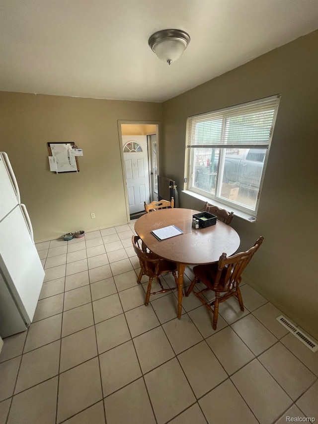 8415 Cappy Ln, Swartz Creek, MI 48473 - dining space with light tile patterned floors