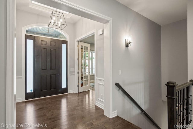 1641 Traceky, Rochester Hills, MI 48306 - foyer entrance with dark wood-type flooring and a chandelier