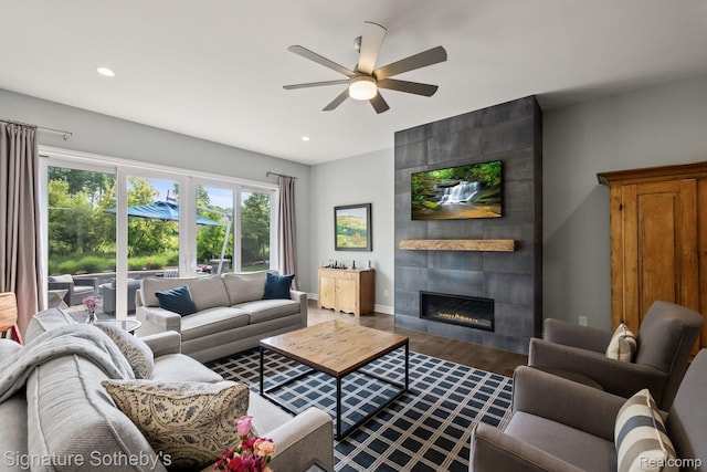 1641 Traceky, Rochester Hills, MI 48306 - living room with ceiling fan, a tile fireplace, wood finished floors, healthy amount of natural light, and recessed lighting