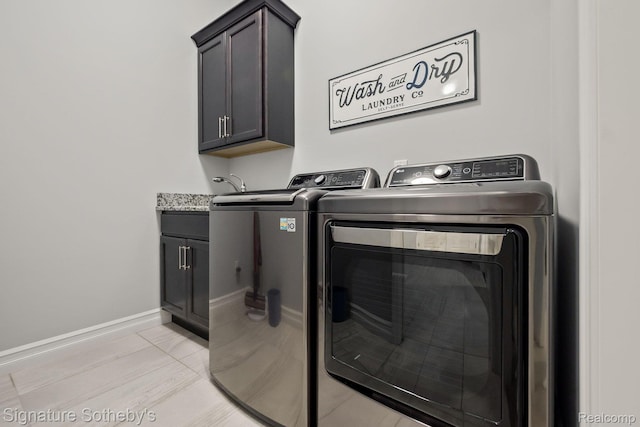 1641 Traceky, Rochester Hills, MI 48306 - laundry room featuring cabinet space and washing machine and clothes dryer