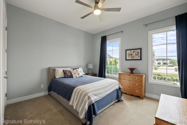 1641 Traceky, Rochester Hills, MI 48306 - bedroom featuring light carpet, multiple windows, and ceiling fan