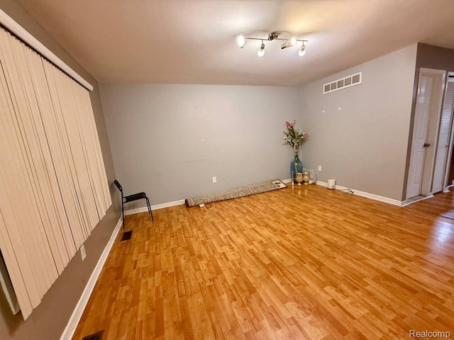 38132 Jamestown Dr, Sterling Heights, MI 48312 - unfurnished room with light wood-style floors and baseboards