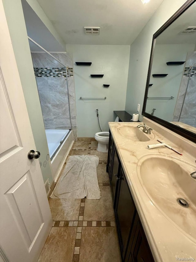38132 Jamestown Dr, Sterling Heights, MI 48312 - full bathroom featuring bathtub / shower combination, double vanity, and toilet
