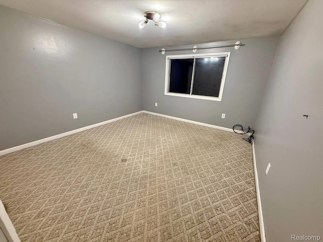38132 Jamestown Dr, Sterling Heights, MI 48312 - spare room with carpet floors and baseboards