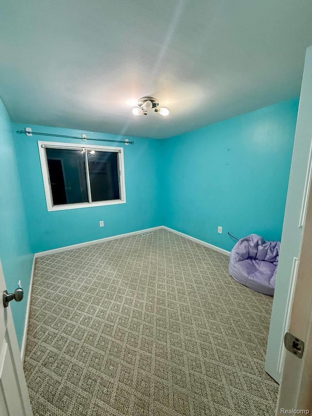 38132 Jamestown Dr, Sterling Heights, MI 48312 - carpeted empty room with baseboards