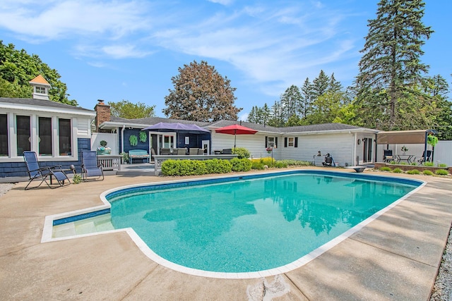 3210 Niles Buchanan Rd, Buchanan, MI 49107 - outdoor pool featuring a patio and a wooden deck