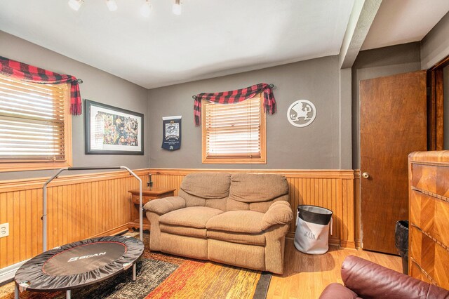 3210 Niles Buchanan Rd, Buchanan, MI 49107 - living area featuring wainscoting and wood finished floors