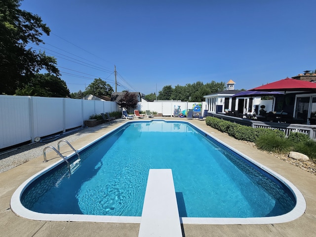 3210 Niles Buchanan Rd, Buchanan, MI 49107 - view of pool featuring a diving board, a fenced backyard, a patio area, and a gazebo