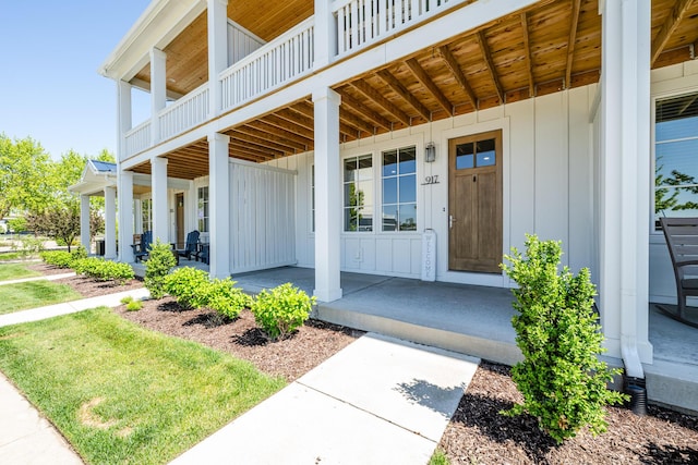 917 Harbor Dr E, Saint Joseph, MI 49085 - view of exterior entry with board and batten siding