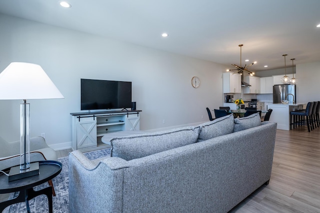 917 Harbor Dr E, Saint Joseph, MI 49085 - living area featuring recessed lighting, light wood-style flooring, and baseboards