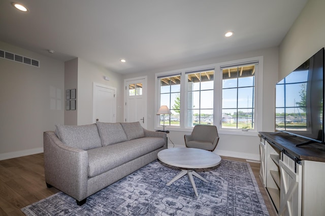 917 Harbor Dr E, Saint Joseph, MI 49085 - living area with dark wood-type flooring, baseboards, and recessed lighting