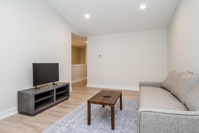 917 Harbor Dr E, Saint Joseph, MI 49085 - living room with light wood-style floors, recessed lighting, baseboards, and lofted ceiling