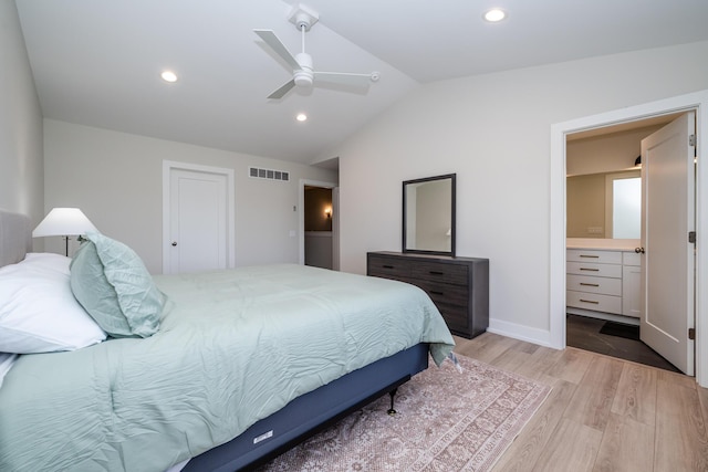 917 Harbor Dr E, Saint Joseph, MI 49085 - bedroom with vaulted ceiling, light wood-style floors, connected bathroom, recessed lighting, and a ceiling fan
