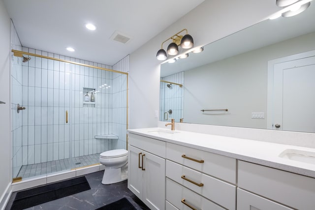 917 Harbor Dr E, Saint Joseph, MI 49085 - full bathroom featuring double vanity, a shower stall, toilet, and recessed lighting