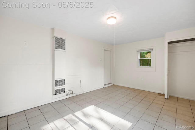 23808 Beierman Ave, Warren, MI 48091 - unfurnished bedroom with a heating unit, a closet, and baseboards