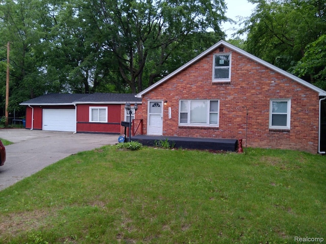 23808 Beierman Ave, Warren, MI 48091 - view of front facade with driveway, a front lawn, an attached garage, and brick siding