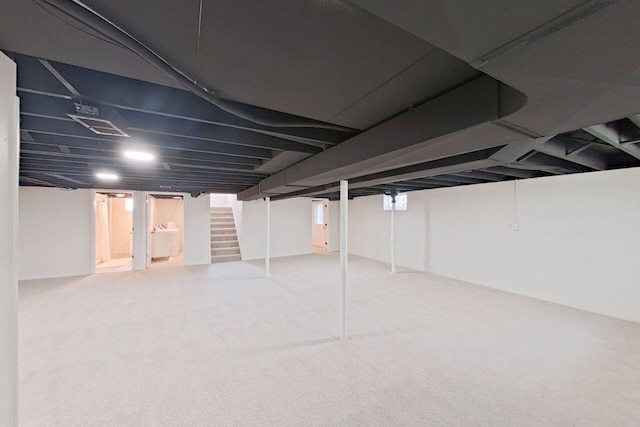 2113 12th St, Wyandotte, MI 48192 - finished below grade area featuring stairs and carpet floors
