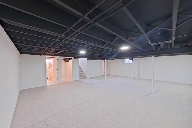 2113 12th St, Wyandotte, MI 48192 - finished basement featuring carpet flooring and stairway