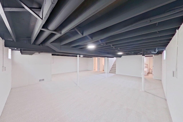 2113 12th St, Wyandotte, MI 48192 - finished basement with stairs and carpet