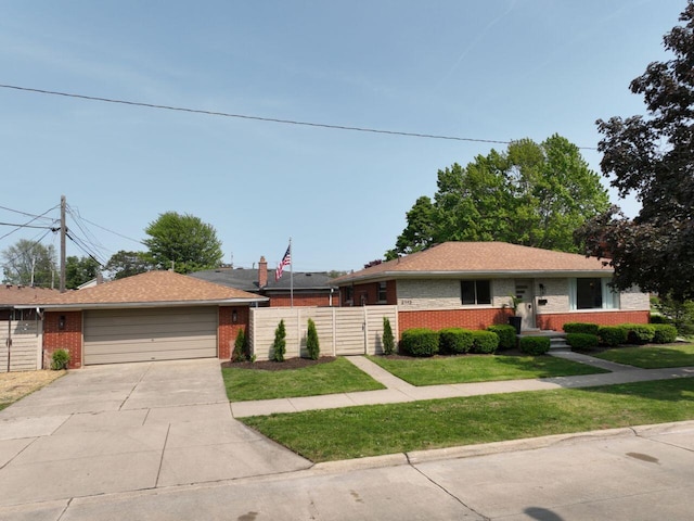 2113 12th St, Wyandotte, MI 48192 - single story home featuring brick siding, driveway, and a garage