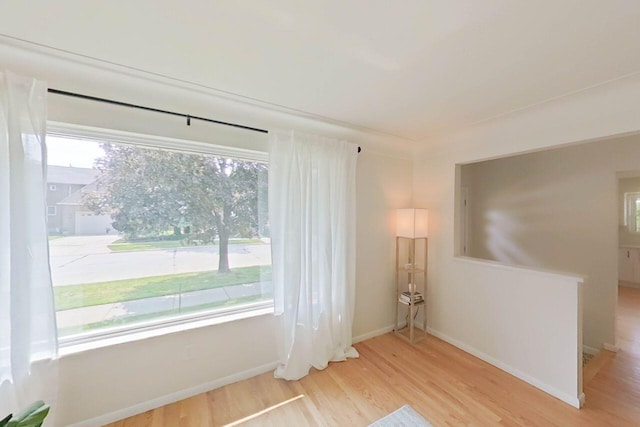 2113 12th St, Wyandotte, MI 48192 - unfurnished room featuring wood finished floors and baseboards