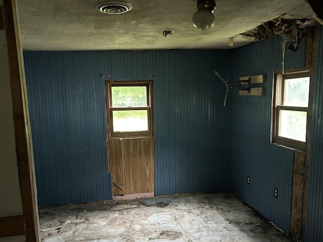11312 Fitzgerald Ave, Grant, MI 49327 - unfurnished room featuring healthy amount of natural light