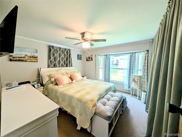 3730 Pinelands Rd, Gladwin, MI 48624 - bedroom with carpet floors, crown molding, and ceiling fan