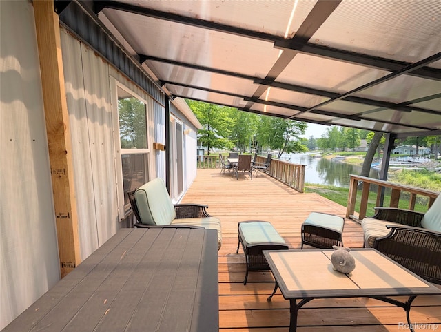 3730 Pinelands Rd, Gladwin, MI 48624 - deck featuring a water view and outdoor dining space