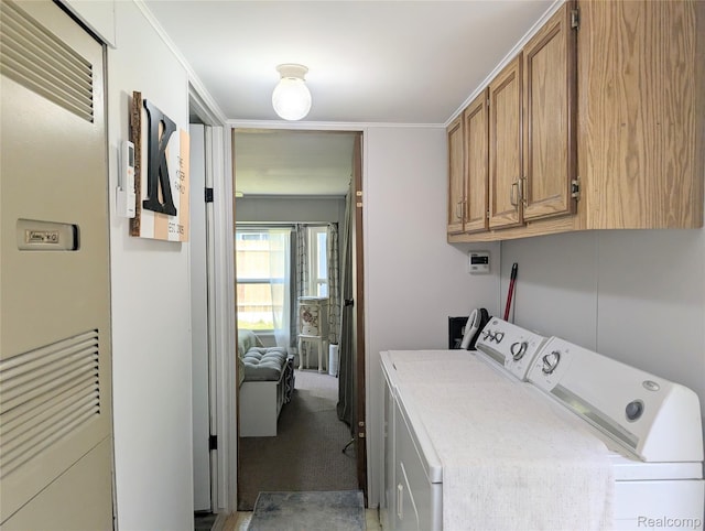 3730 Pinelands Rd, Gladwin, MI 48624 - washroom with separate washer and dryer, cabinet space, and light carpet