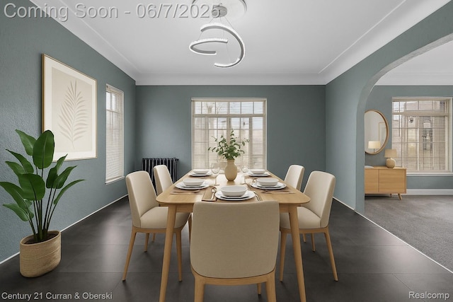 15915 Vaughan St, Detroit, MI 48223 - dining space featuring arched walkways, plenty of natural light, crown molding, and baseboards