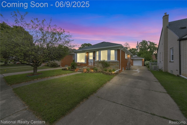 11322 Leverne, Redford, MI 48239 - bungalow-style home with a front yard, an outbuilding, a garage, stone siding, and brick siding