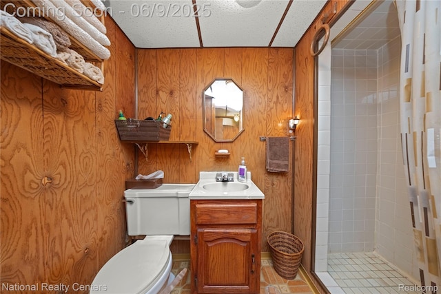 11322 Leverne, Redford, MI 48239 - bathroom featuring a shower stall, vanity, toilet, tile patterned floors, and wood walls