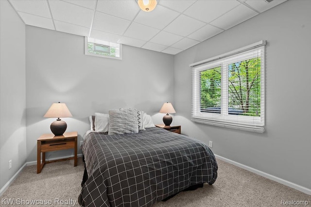 1307 Trillium Ct, Wixom, MI 48393 - carpeted bedroom with multiple windows and a paneled ceiling
